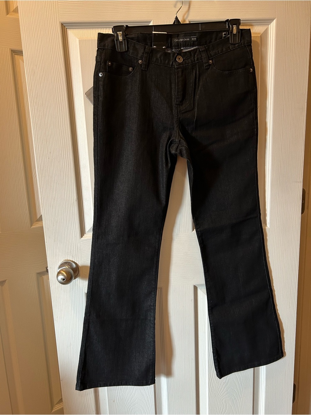 Calvin Klein Size 10 Jeans Black Flare Denim 31 Inch Inseam Regular Fit NWT.